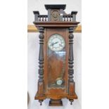 EARLY 20TH CENTURY WALNUT WALL CLOCK WITH WHITE ENAMEL DIAL