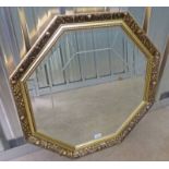 OCTAGONAL GILT FRAMED MIRROR - MAXIMUM SIZE 70 CMS