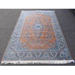 EASTERN CARPET DECORATED WITH BLUES AND BROWNS 171 X 240 CM