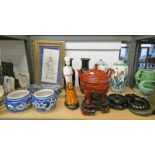 BLUE AND WHITE ORIENTAL JARS, CARVED WOOD STANDS,