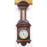 LATE 19TH CENTURY EARLY 20TH CENTURY ANEROID MAHOGANY CASED BAROMETER WITH CASED DECORATION