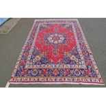 RED GROUND PERSIAN TABRIZ CARPET WITH FLORAL MEDALLION PATTERN 278 X 195CM
