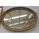 OVAL GILT FRAMED MIRROR,