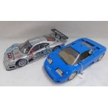 TWO BURAGO 1:18 SCALE BUGATTI MODEL VEHICLES INCLUDING EB110 TOGETHER WITH CHIRON