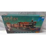 HORNBY R1095 00 GAUGE HARRY POTTER AND THE ORDER OF THE PHOENIX HOGWARTS EXPRESS ELECTRIC TRAIN SET.