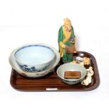 A Chinese tea bowl marked from Tek Sing Treasures together with a blue and white bowl from Nanking
