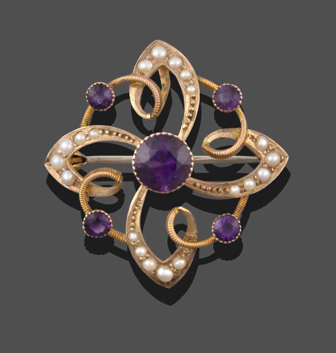 An Amethyst and Seed Pearl Brooch/Pendant, a round cut amethyst, to four further smaller amethysts