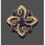 An Amethyst and Seed Pearl Brooch/Pendant, a round cut amethyst, to four further smaller amethysts