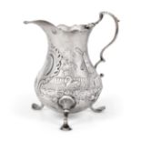 A George III Silver Cream-Jug, Maker's Mark AS NS, London, 1768, pear-shaped and on pad feet, one