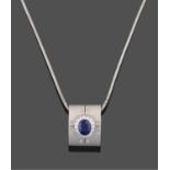 A Sapphire and Diamond Pendant on Chain, an oval cut sapphire within a border of round brilliant cut