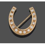 A 9 Carat Gold Diamond Horseshoe Brooch, the horseshoe motif set throughout with round brilliant cut