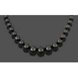 A Jet Necklace, comprising of seventy-one graduated spherical jet beads, length 58cm see