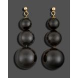 A Pair of Jet Drop Earrings, comprised of three graduated spherical jet beads, drop length 4.9cm,
