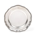 A Victorian Silver Dinner-Plate, by Robert Garrard, London, 1865, shaped circular and with gadrooned