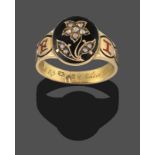 A Diamond and Enamel Mourning Ring, rose cut diamonds in the form of a floral motif on a black