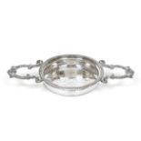 A George IV Silver Lemon-Strainer, by John Reily, London 1821, the bowl pierced circular and with