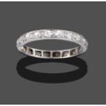A Diamond Eternity Ring, the old cut diamonds in white claw settings, to a flat sided shank, total