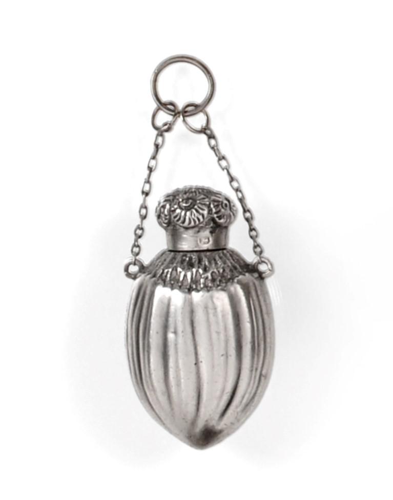 A Victorian Silver-Mounted Scent-Bottle, by Saunders and Shepherd, Birmingham, 1888, Design