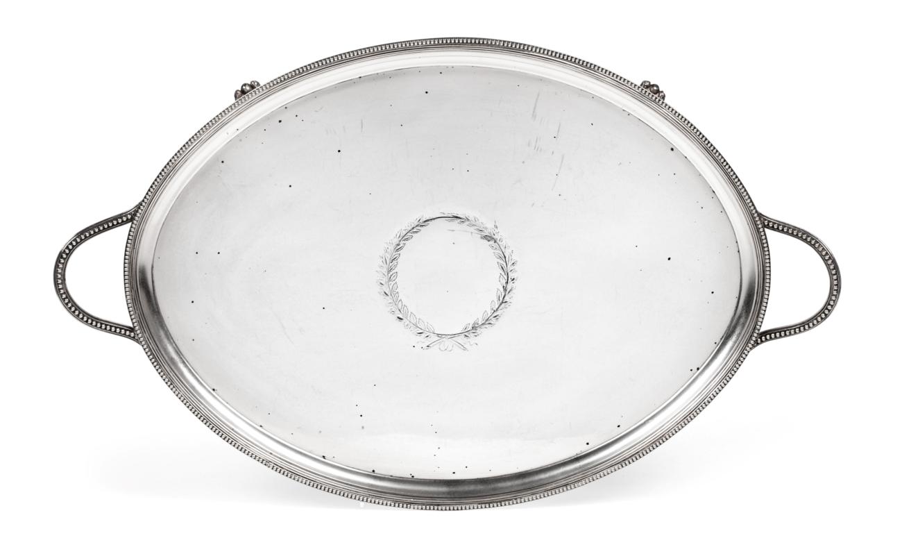 A George III Silver Tray, by Timothy Renou, London, 1794, oval and with beaded border and two beaded