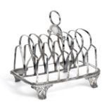 A George III Silver Toastrack, by Rebecca Emes and Edward Barnard, London, 1815, oblong and on