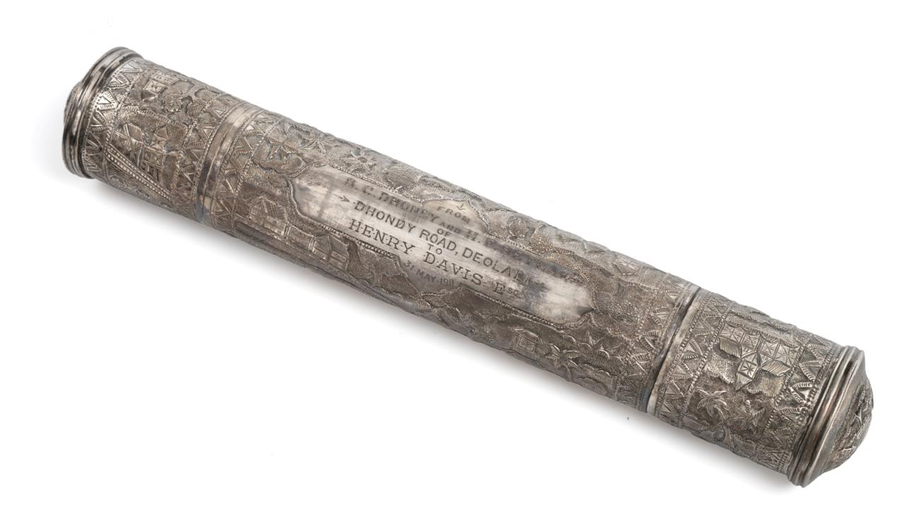 An Indian Silver Scroll-Holder, Apparently Unmarked, dated 1911, tubular and chased with buildings