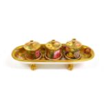 A Spode Porcelain Deskstand, circa 1806, of tray form, floral decoration, gilt ground, four claw