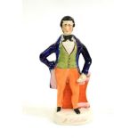 A Staffordshire Pottery Figure of Richard Cobden, mid 19th century, standing, 23cm high