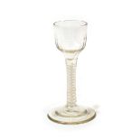 A Cordial Glass, circa 1750, the semi-fluted ogee bowl on a opaque twist stem, 13.5cm high; A Wine