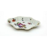 An English Decorated Chinese Porcelain Spoon Tray, circa 1750, of fluted rounded rectangular form,