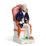 A Staffordshire Pottery Figure of the Duke of Wellington, mid 19th century, seated, 30cm high See