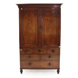 ^ A Victorian Mahogany Linen Press, mid 19th century, the moulded cornice above two moulded cupboard
