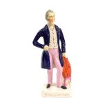 A Staffordshire Pottery Figure of the Duke of Wellington, mid 19th century, standing, 33cm high