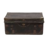 A Brass Bound and Leather Covered Camphorwood Trunk, late 18th century, with loop carrying handles