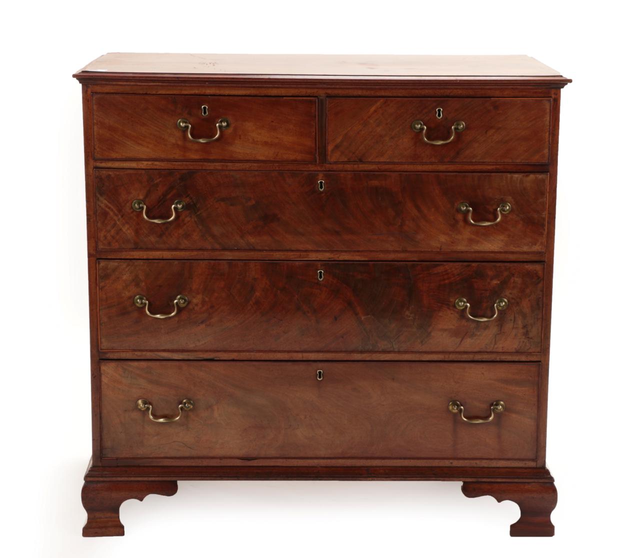 A George III Mahogany and Boxwood Strung Straight Front Chest of Drawers, circa 1800, the moulded