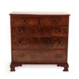 A George III Mahogany and Boxwood Strung Straight Front Chest of Drawers, circa 1800, the moulded
