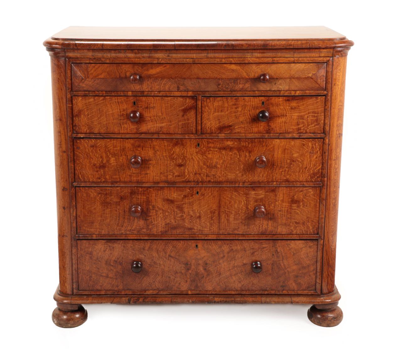 A Victorian Pollard Oak Straight Front Chest of Drawers, mid 19th century, the moulded top above a