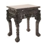 A Chinese Hongmu Stand, Qing Dynasty, 19th century, the rectangular top over a carved and pierced