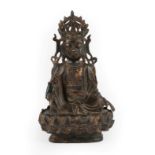 A Copper Alloy Figure of Buddha on a Stand, late Ming Dynasty, seated with scroll headdress, on a