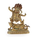 A Gilt Bronze Figure of a Wrathful Deity, 18th/19th century, with hands raised and snarling
