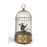 A Small Double Singing Birds-In-Cage, By Karl Griesbaum, post-war model, with perched red bird and