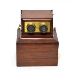 Tabletop Achromatic Stereoscope in mahogany case which becomes a plinth, with brass fitting