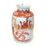 A late 19th century Chinese vase of baluster form, decorated in ironstone red and gilt, depicting