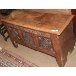 An 18th century oak coffer and an 18th century carved oak chair (2)