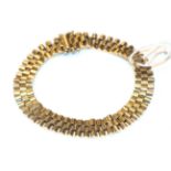 A 9 carat gold brick link bracelet, length 20cm . Gross weight 22.7 grams.