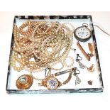 A lady's 18 carat gold wristwatch; a Victorian brooch, unmarked; a single earring, stamped '375';
