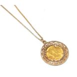 A 1910 full sovereign loose mounted as a pendant on chain, pendant length 4.3cm, chain length 60.5cm