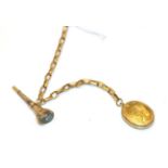 A locket on chain with attached seal (a.f.). Unmarked, 25.6 grams.