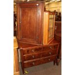 An early 20th century chest of drawers, with two short drawers over three long drawers; together