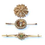 A seed pearl star brooch, stamped '15CT', length 3.6cm; a peridot and seed pearl bar brooch, stamped