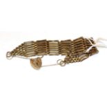 A 9 carat gold gate bracelet, length 20cm . Gross weight 25.4 grams.